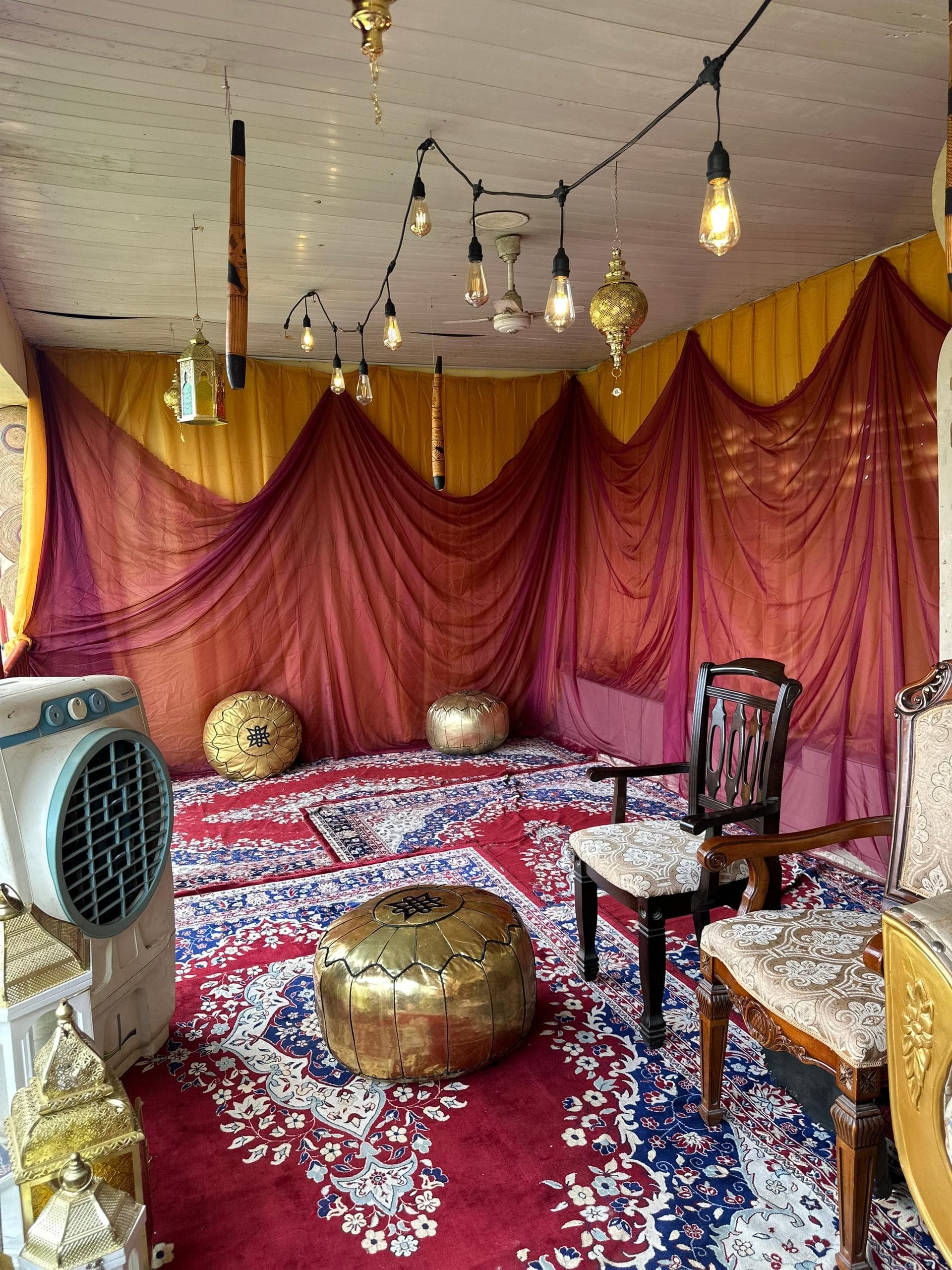 Durbar decoration Lagos — cultural textile accents and ornate candelabra arrangement